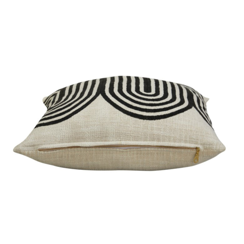 18" x 18" decorative pillow with graphic design featuring an undulating curves pattern. Black print on ivory background. Handprinted by talented artisans using traditional hand block printing techniques, finished with YKK golden zipper. Pillow insert included.