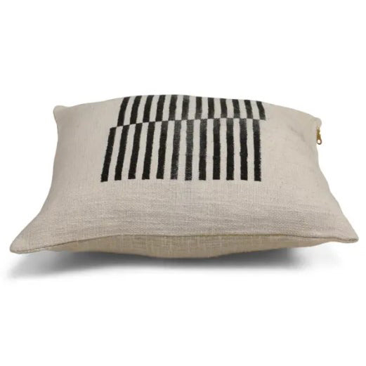 18" x 18" decorative pillow with graphic design featuring an offset linear pattern. Black print on ivory background. Handprinted by talented artisans using traditional hand block printing techniques, finished with YKK golden zipper. Pillow insert included.