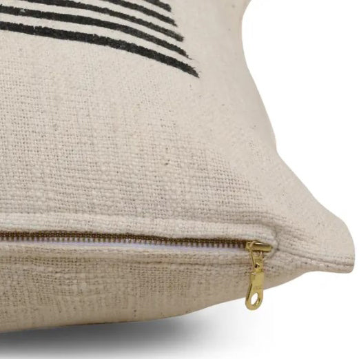 18" x 18" decorative pillow with graphic design featuring an offset linear pattern. Black print on ivory background. Handprinted by talented artisans using traditional hand block printing techniques, finished with YKK golden zipper. Pillow insert included.