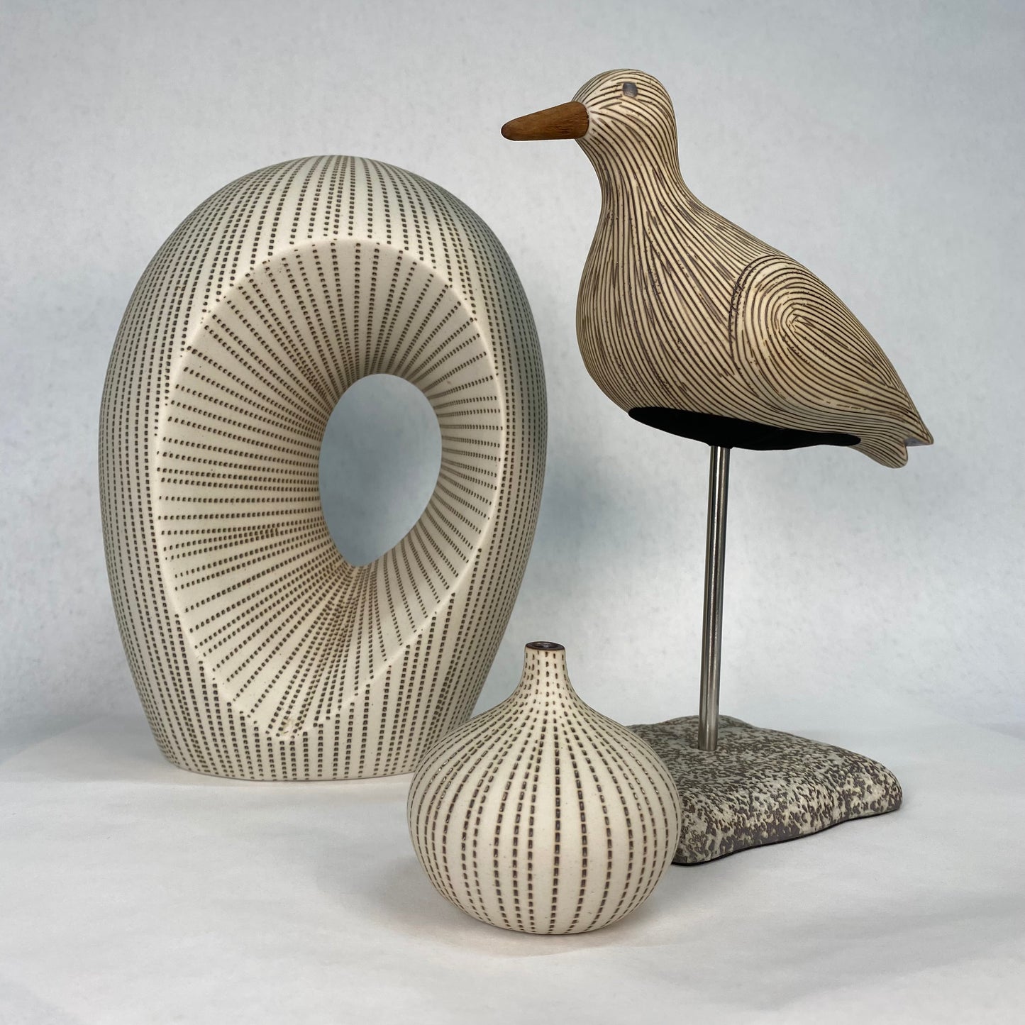 White and Brown Bird Sculpture
