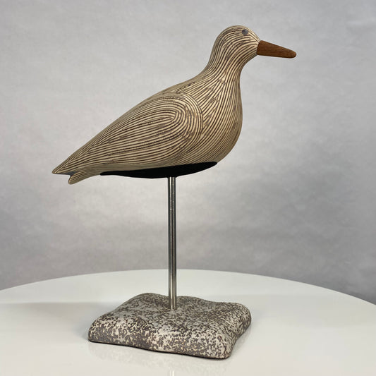 White and Brown Bird Sculpture