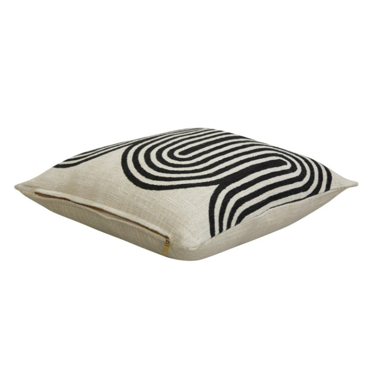 18" x 18" decorative pillow with graphic design featuring an undulating curves pattern. Black print on ivory background. Handprinted by talented artisans using traditional hand block printing techniques, finished with YKK golden zipper. Pillow insert included.